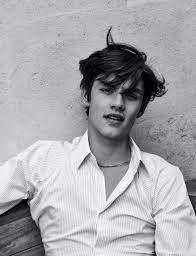 The same year, he appeared in two short films, beneath water and about a dog. Enola Holmes Star Louis Partridge Covers Man About Town