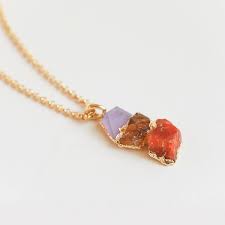 This power stone stimulates 3 lower chakras to aid physical intimacy. Amethyst Citrine Carnelian Pendant
