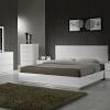 Features extra deep storage drawers with a slat support system that requires only a mattress. 1