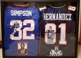 Aaron josef hernandez was an american football tight end and convicted murderer. Man Selling Killer Combo Oj Simpson Aaron Hernandez Framed Signed Jerseys On Ebay Pics