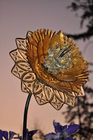The aluminum material tends to be more expensive so that it is not suitable for the people having a limited budget. Glass Flower By Wa Artist Glass Garden Flowers Glass Garden Art Glass Flowers
