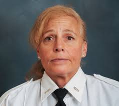 Politicians Bicker Over Flag-Pin Use; EMT patch displaces Stars and Stripes 