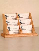 It's also one of the most affordable business card holders on this list, which makes it a perfect gift for clients and coworkers. Wooden Multiple Business Card Holders 9 Pocket Desk Design