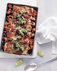 Kayla Itsines Sweet Potato Enchilada Recipe Well Good Sweet Potato Enchilada Recipe Recipes Stuffed Sweet Potato Healthy