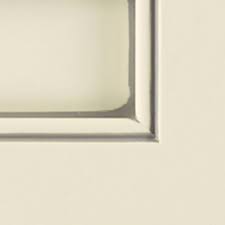 White paint is frequently used with gray cabinets to provide plenty of contrast and keep the design from feeling too dark. Seashell Pewter Glaze Maple Finish Kitchen Craft