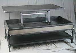 Interestingly, the upper part of the table is lifted up and will serve as logan presents to you excellence in furniture with this lift top table. Amazon Com Vintage Industrial Lift Top Coffee Table Distressed Metal Adjustable Height Coffee Table Reclaimed Wood Avail Handmade And Customizable Handmade