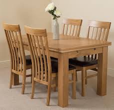 Shop the latest oak dining table and choose from top modern and contemporary designer brands at ylighting. Richmond Extending Oak Dining Table With 4 Brown Harvard Dining Chairs