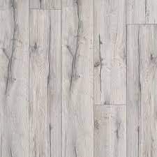 Don't use abrasive or acidic cleaners. Renaissance Gray Water Resistant Laminate 12mm 100493006 Floor And Decor