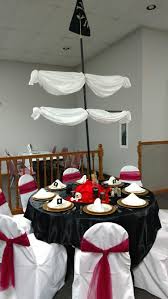 Lads, lassies and scallywags of all ages are welcome. Pirates Of The Caribbean Table At My Daughter S Disney Themed Wedding Pirate Wedding Theme Pirate Wedding Pirates Of The Caribbean