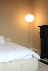 This contemporary table and floor lamp fits naturally into any design aesthetic, emitting a warm, diffused light. Glo Ball F1 Floor Lamp Flos Flos F3031020