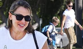 Jennifer Garner gives son Samuel a kiss as she treats her smiling boy to an  ice cream after school