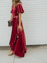 A Pink Velvet Wrap Dress Tan Shoes And A Clutch For A Trendy And Very Cozy Look Velvet Clothes Wedding Guest Outfit Fall Beauty Dress