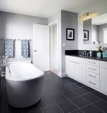 I love a dark sea blue with white trimmings (window sill, shower cur. How To Use Dark Floors To Brighten Your Dull Home Dark Gray Bathroom Black Bathroom Floor Gray Tile Bathroom Floor
