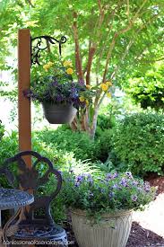 Diy Standing Outdoor Plant Hanger Confessions Of A Serial Do It Yourselfer Outdoor Plant Hanger Outdoor Plants Diy Garden