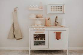 Katie loves …the major makeover of an ikea toy kitchen, done lovingly by anchors & honey. A Modern Inspired Ikea Play Kitchen Makeover Kandis Marino Photography