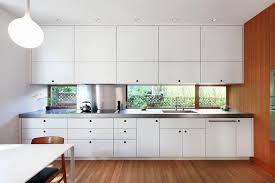 Kitchen Design Ideas White Modern And Minimalist Cabinets Crisp White Cabinetry In This Kit Kitchen Design Minimalist Kitchen Cabinets Minimalist Cabinet