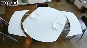 It is made of durable mdf, which subsequently had a white coating on all surfaces. Baobab Round White Glass Extendable Kitchen Table On Wood Base Youtube
