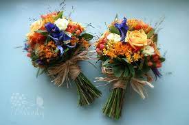It's all about wedding day of barry and donna. Rustic Bridesmaid Bouquet In Blue And Orange Orange Wedding Flowers Rustic Bridesmaids Flower Bouquet Wedding