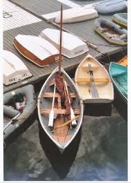 An anchor is a device, normally made of metal, used to connect a vessel to the bed of a body of water to prevent the craft from drifting due to wind or current. Various Types Of Dinghies Tied Up To The Local Dinghy Dock When Boats Are Riding At Anchor Anchored Out Their Dinghy Classic Boats Wooden Boats Boat Design