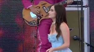 We're all out here talking trash, making bets, lips wrapped round our cigarettes. Kacey Musgraves Blowin Smoke Live At Farm Aid 30 Youtube