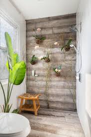 Wood Plank Tile Shower With Living Orchids Wall Hgtv Hardwood walls can provide the perfect balance between rustic and modern or even classic styles.