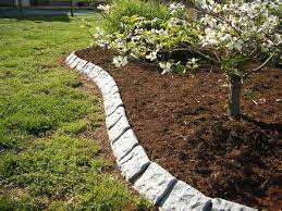 Wooden edging is ideal for keeping soil, gravel and bark in place or for creating raised beds and rockeries. Decorative Stone Garden Edging Landscape Edging Landscape Edging Stone Garden Edging Stones