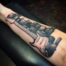(14) tattoo artist means any person, regardless of age, who engages in the practice/service of tattooing regardless of the type of tattoo or area to be tattooed; Tattoos By Brad Dozier Made This Cool Little Guitar And Nashville Skyline
