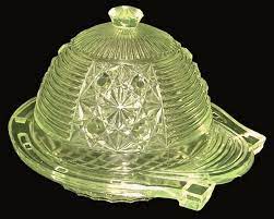 Yes, canary glass, uranium glass, or vaseline glass , as it became known in the early 20th century for its similar color to petroleum jelly, emits radiation, but the amounts are tiny, infinitesimal, ridiculously small. These People Love To Collect Radioactive Glass Are They Nuts Collectors Weekly
