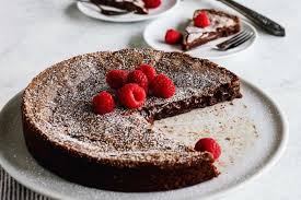 It is a wreath shaped pastry spiced with cardamom and filled with almond paste. Swedish Sticky Chocolate Cake Easy Kladdkaka Recipe