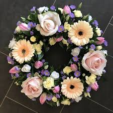 Elegant white rose sheaf £29.99 goto florist Pretty Pastel Mix Loose Filled Wreath Design Funeral Flowers Tribute Funeral Flower Arrangements Funeral Flowers Memorial Flowers