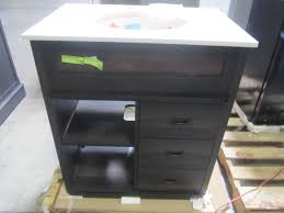 This barn door vanity is sure to please. Style Selections Morriston Distressed Java Single Sink Vanity With White Engineered Stone Top Common 30 In X 20 In Wsl30bhv Mn Home Outlet Burnsville 134 Saturday Pick Up Only 10 00am 2 00pm