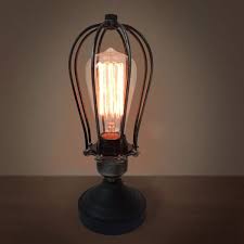 Squirrel Cage Table Lamp This Unique Collection Of Industrial Wall Lamps Are Handmade From A Rustic Fin Vintage Table Lamp Cage Table Lamp Steampunk Table Lamp