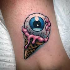 By getting a enormous tattoo of an ice cream cone on his right cheek! 60 Ice Cream Tattoo Ideas For Men Frozen Dessert Designs
