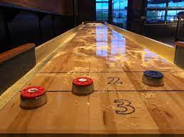 Not only is the game fun the rules of shuffleboard are fairly simple. Shuffleboard Rules How To Play Shuffleboard A Complete Guide