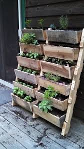 Mason jars or old glass containers can be used for this project. 18 Vertical Planters To Save Your Outdoor Space Shelterness