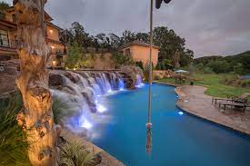 However, they are a fun alternative and one could be designed to work within your budget. Multi Level Pool With Rope Swing Sunken Fire Pit Waterfalls Swim Up Bar Transitional Pool Oklahoma City By Caviness Landscape Design Inc Houzz