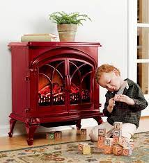 Before we get to the reviews, let's take a few minutes to look at the different types that are available and also make note of the major points in our review of the best electric fireplaces, coming in second is the best tv stand fireplace heater by walker edison furniture! After Coveting The Shiny Red Electric Stove Space Heaters At Plow Hearth For Years Finally Grabbed Th My Home Design Electric Stove Electric Fireplace Heater