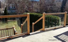 Woodway's post caps embrace the look and feel of wood or glass and exemplify classic american architecture. Backyard View Concrete Deck With Cedar And Tempered Glass Railing Railings Outdoor Concrete Patio Concrete Deck