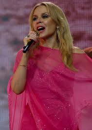 It was the decade of big hair, big phones, pastel suits, cabbage patch kids, rubik's cubes, yuppies. Kylie Minogue Wikipedia