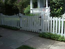 Our fence panels are finished in a white primer coating (undercoat). White Picket Fence And Double Gates Contemporary Garden Seattle By Green Spaces Landscaping Houzz