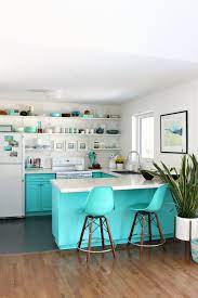 Supply list for white glazed turquoise cabinet. Simple Spring Home Tour Dans Le Lakehouse Kitchen Inspiration Design Lake House Kitchen Open Shelving Kitchen Cabinets