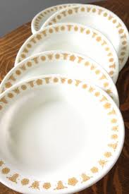To figure out what your pattern is called, check out this list of discontinued corelle dinnerware patterns. Vintage Corelle Butterfly Gold Set Of 8 Large Soup Bowls Or Etsy Corelle Dishes Butterfly Gold Butterfly Gold Pyrex