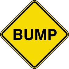 Bump yellow road sign