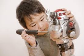 boy fixing robot picture of a little chinese boy fixing an electronic toy robot ad robot picture boy fixing chine electronic toys robot toy robot