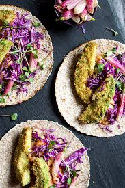Lay 1 corn tortilla flat, add a small scoop of vegan fish, slaw, and black bean & mango salsa. 11 Tasty Taco Recipes To Make On Cinco De Mayo Amodrn