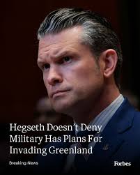 The military members standing behind Vance during his live TV presser in  Greenland don't look to thrilled about taking over Greenland by force if  necessary…