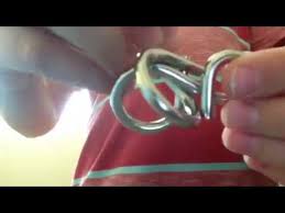 Watch double m metal ring puzzle solution for free. How To Solve The Double 8 Ring Puzzle Youtube