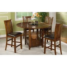 The table converts from a square table to a round table by simple four leaves. Winners Only Dining Tables Zahara T1 Zh54260 O 60 Round Tall Table Round From Brandsource Canada