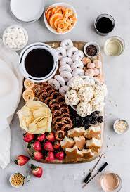 Chocolate Fondue Dessert Board Rich And Decadent Chocolate Fondue Is Perfect For Entertaining This Easy Dessert Desserts Snack Platter Chocolate Fondue Set