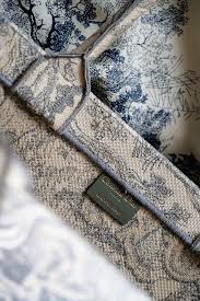 The dior book tote, an original style introduced by creative director maria grazia chiuri, has become a staple of the dior aesthetic. Stunning Dior Toile De Jouy Embroidery Book Tote Purseblog